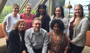 IPI's Senior Healthcare Recruiter Marcheta H.(back row, standing in the middle), with the IPI Scheduling Team. Back row , left to right: Courtney, Jessica, Marcheta, Shineka (Scheduling Manager), and Kim. Front row, left to right: Carli, Andy, and Claudia. 