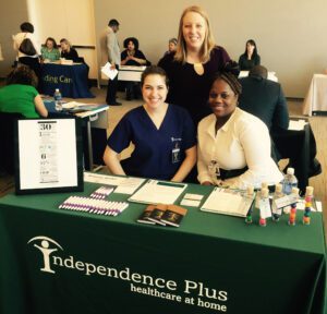 Tori, RN, (pictured seated on the left), joins IPI’s Home Nursing Residency Manager Brittany, RN, (pictured standing), and IPI’s Recruitment Specialist Alishia at a healthcare career fair at Malcolm X College in Chicago. 